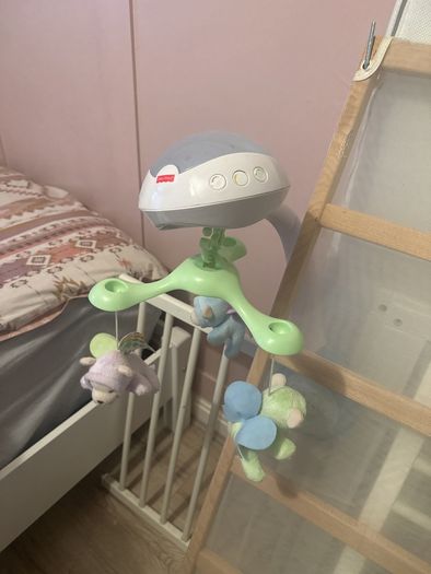 white cot with mattress