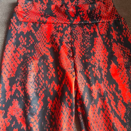 Brand new Red snakeskin leggings, size M