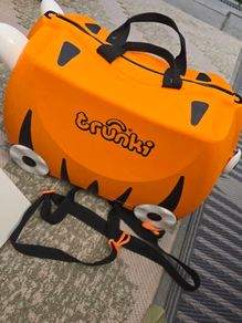 trunki orange suitcase