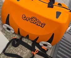 trunki orange suitcase