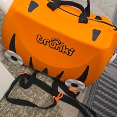 trunki orange suitcase