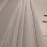 beautiful full length white halterneck dress by Wyldr Image 6