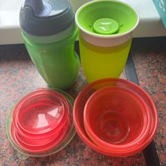 Selection of sippy cups and food containers