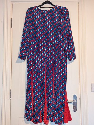 Beautiful multi colored dress with belt to adjust size