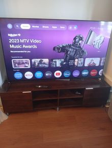 Bravia 65 inch TV and cabinet
