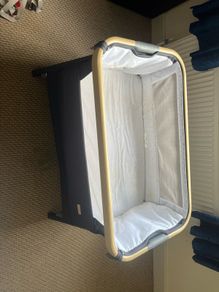 Tutti Bambini CoZee Lite Bedside Crib in Charcoal and Oak effect.
