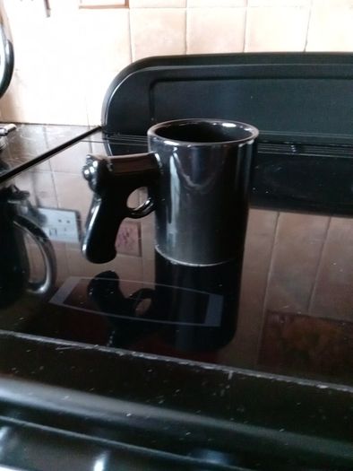 coffee mug with gun handle