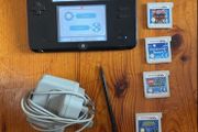 Nintendo 2DS with games and charger