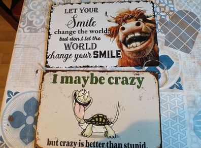 signs 5 each or 2 for 8 euro