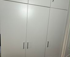 Wardrobe with top cabinet