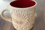 Unglazed Pottery Mug with Geometric Patterns
