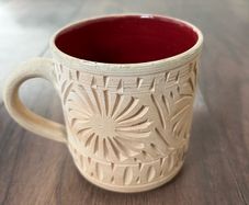 Unglazed Pottery Mug with Geometric Patterns