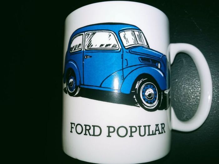 collection of six automotive mugs