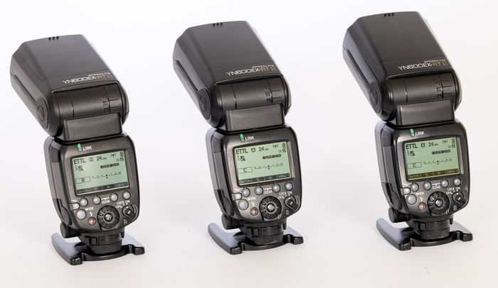 Three Yongnuo YN600EX-RT II flashguns with bag and accessories