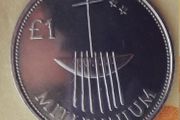 Millennium 1 pound coin in case