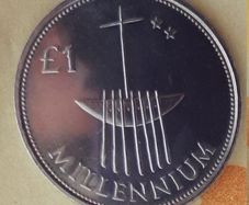 Millennium 1 pound coin in case