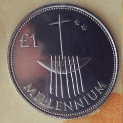 Millennium 1 pound coin in case