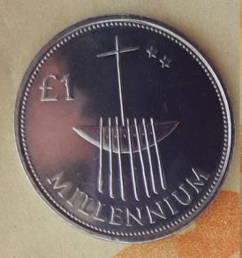 Millennium 1 pound coin in case