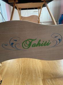 spray tan gun and massages table or lash table