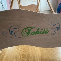 spray tan gun and massages table or lash table