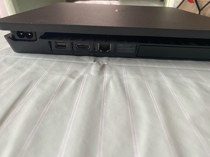 PlayStation 4 PS4 Console with controllers