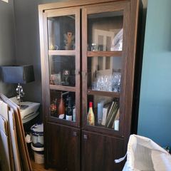 Dark wood glass cabinet