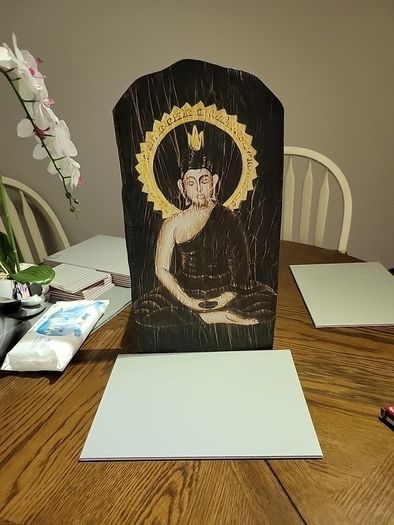 Buddha on wood