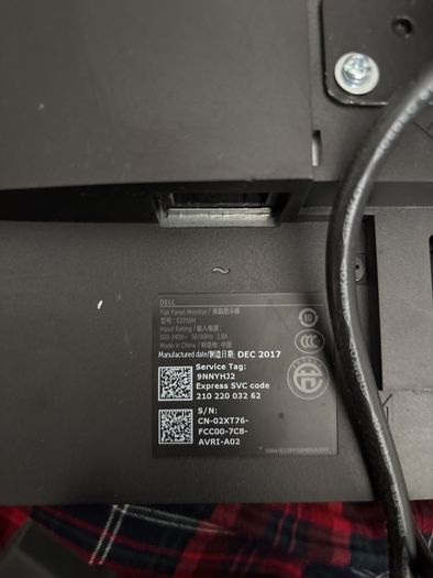 Dell monitor with adjustable stand that clamps to desk