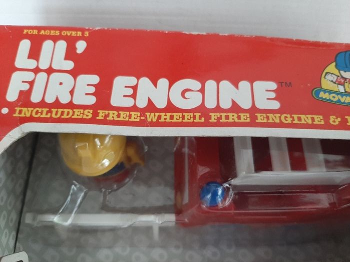 Vintage fire engine with play people and fireman Sam jigsaws
