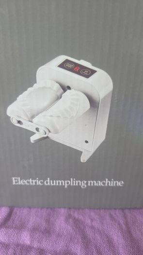 Electric dumpling machine