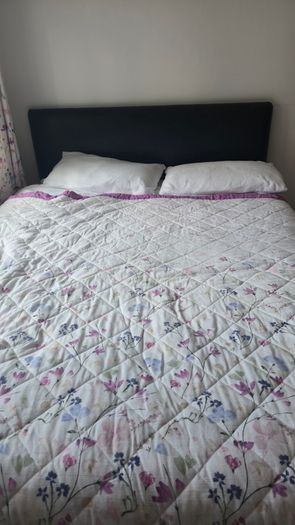 Double beds and kitchen seats