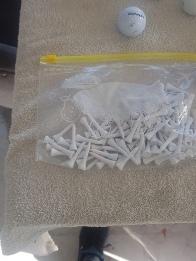 golf ball and tees