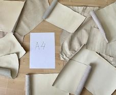 Bundle of white leather pieces