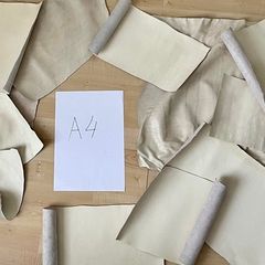 Bundle of white leather pieces
