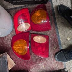 E11 Toyota Corolla 4 doors tail lights