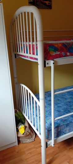 white metal bunk beds