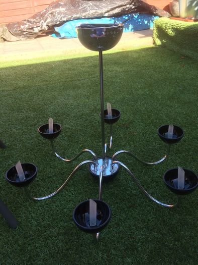 Two chandeliers for sale. Both in good condition. One of the cups is damaged (see photos for better description) not noticeable when hung. Everything else in good condition