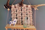 small shelf with deer antler