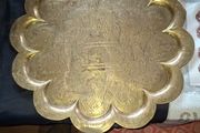 Antique Brass Charger Tray Hand-Engraved Mughal court figures. The Charger has a distinct Scalloped edge and is heavily decorated. Similar items often date from the late 19th century, specifically around the 1870s or 1880s