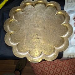 Antique Brass Charger Tray Hand-Engraved Mughal court figures. The Charger has a distinct Scalloped edge and is heavily decorated. Similar items often date from the late 19th century, specifically around the 1870s or 1880s
