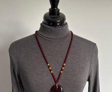 Large deep red necklace