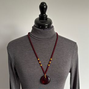 Large deep red necklace