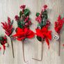 Collection of artificial red poinsettia and berry Image 2