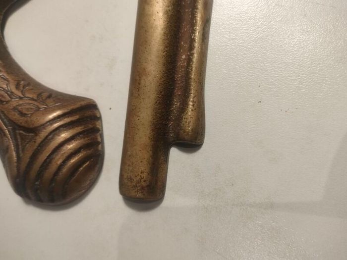 A pair of Early 20th Century 13" Brass Flintlock pistols