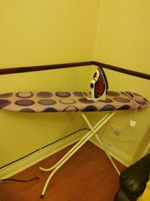 Ironing board and iron.