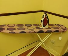 Ironing board and iron.