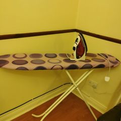 Ironing board and iron.