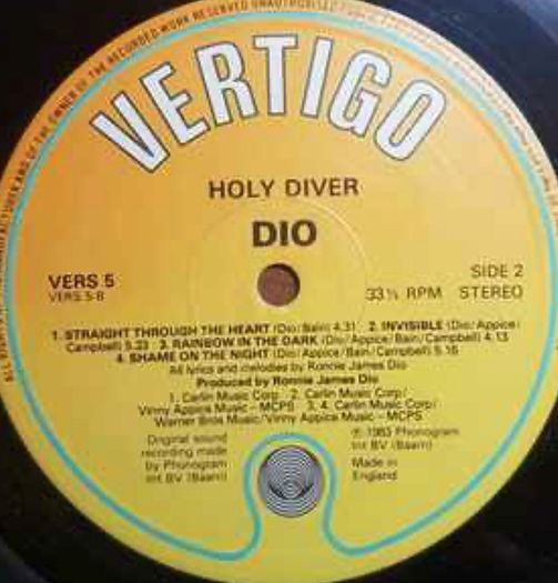 DIO Holy Diver original 1983 release with original inner lyric sheet vinyl record in near mint condition