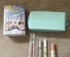 Brand new makeup bag and four brand new products