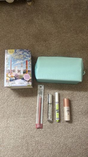 Brand new makeup bag and four brand new products